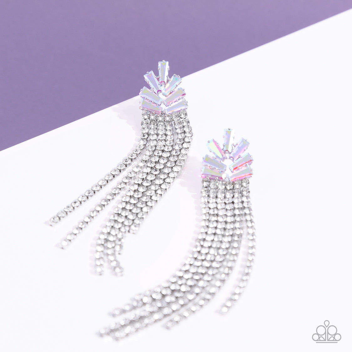 Paparazzi Accessories Overnight Sensation - Multi Sparkly strands of dainty white rhinestones stream out from the bottom of a silver frame made up of a staggered collection of iridescent and trapezoidal cut rhinestones, resulting in a timeless tassel. Ear