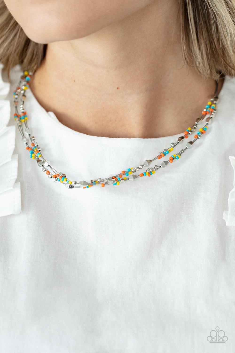 Paparazzi Accessories Explore Every Angle - Multi A dainty collection of faceted silver beads, multi-colored seed beads, and silver cubes are threaded along multiple strands of silver wire below the collar, creating clustered layers. Features an adjustabl