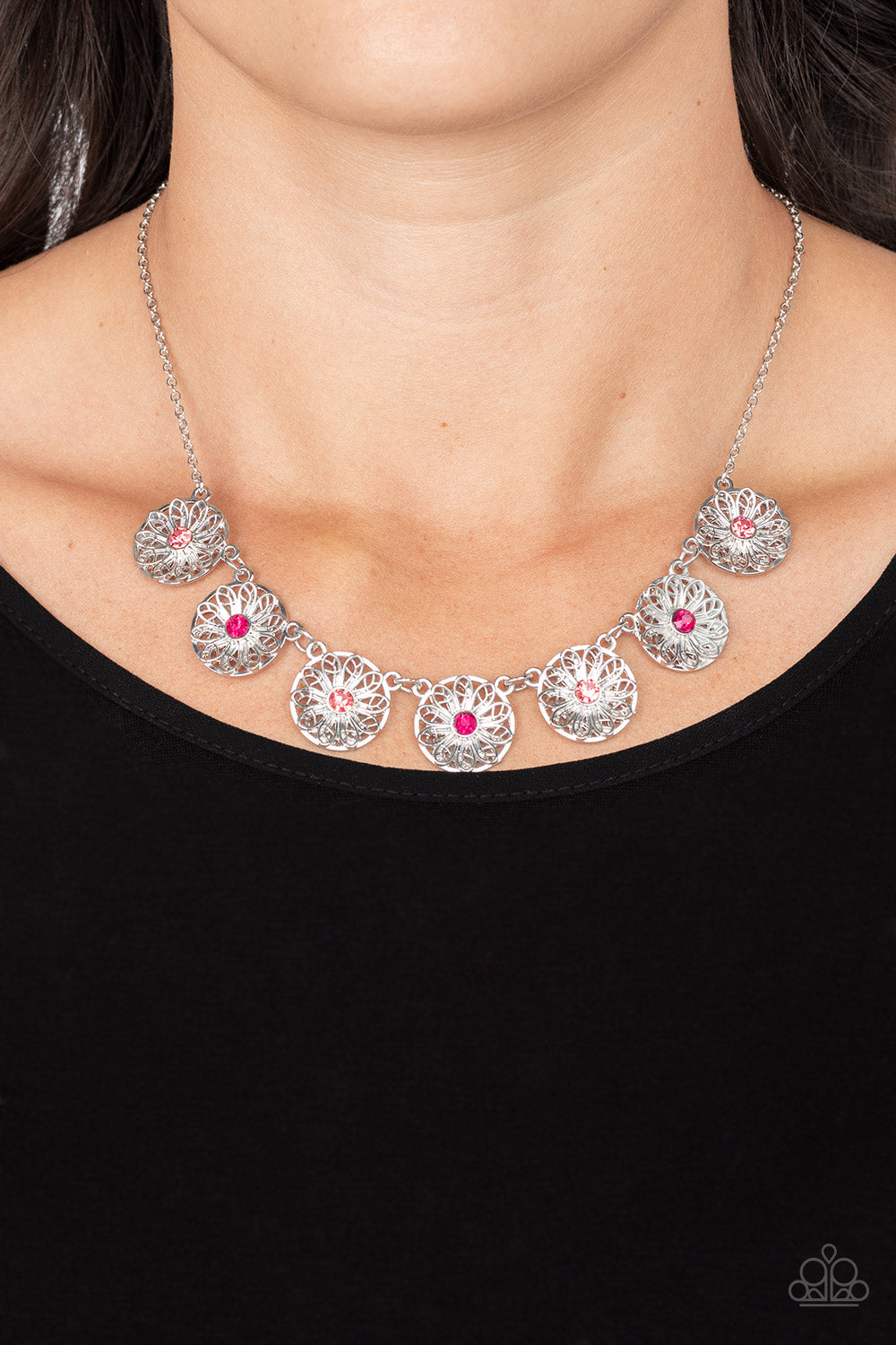 Paparazzi Accessories Garden Greetings - Pink Dotted with dark and light pink rhinestone centers, decorative silver flowers bloom from circular silver frames as they link below the collar for a flirtatious floral fashion. Features an adjustable clasp clos
