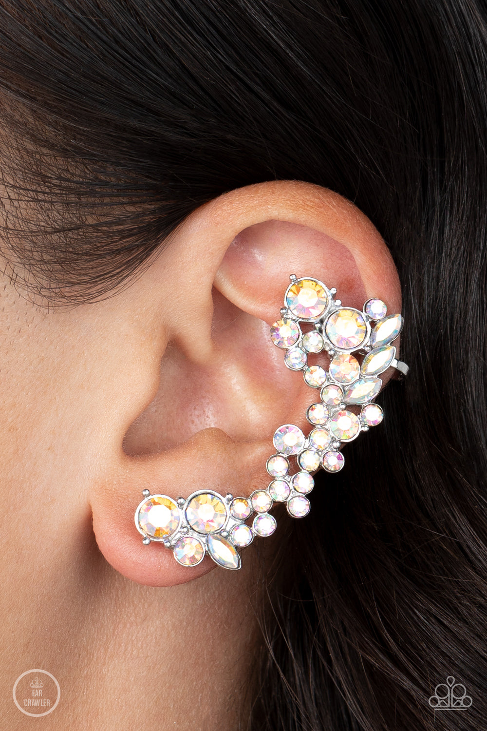 Paparazzi Accessories Astronomical Allure - Multi A sparkly collision of round and marquise cut iridescent rhinestones tumble down the ear, coalescing into an out-of-this-world sparkle. Features a clip-on fitting at the top for a secure fit. Due to its pr