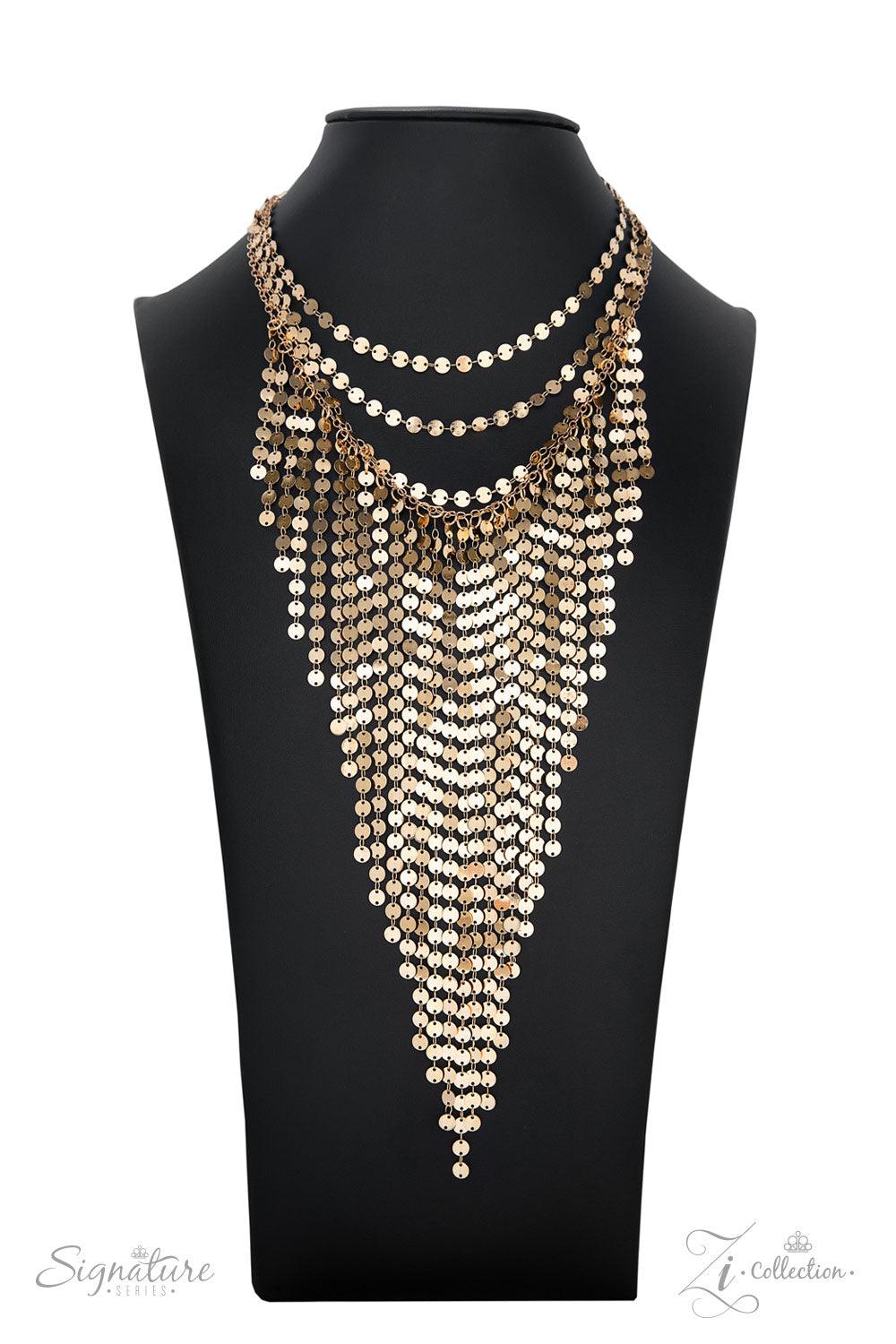 Paparazzi Accessories The Suz A seemingly infinite collection of dainty gold discs flickers and flashes as they catch the light, draping into four shimmery rows down the chest. Twinkly tassels of matching gold discs stream out from the bottom of the lower
