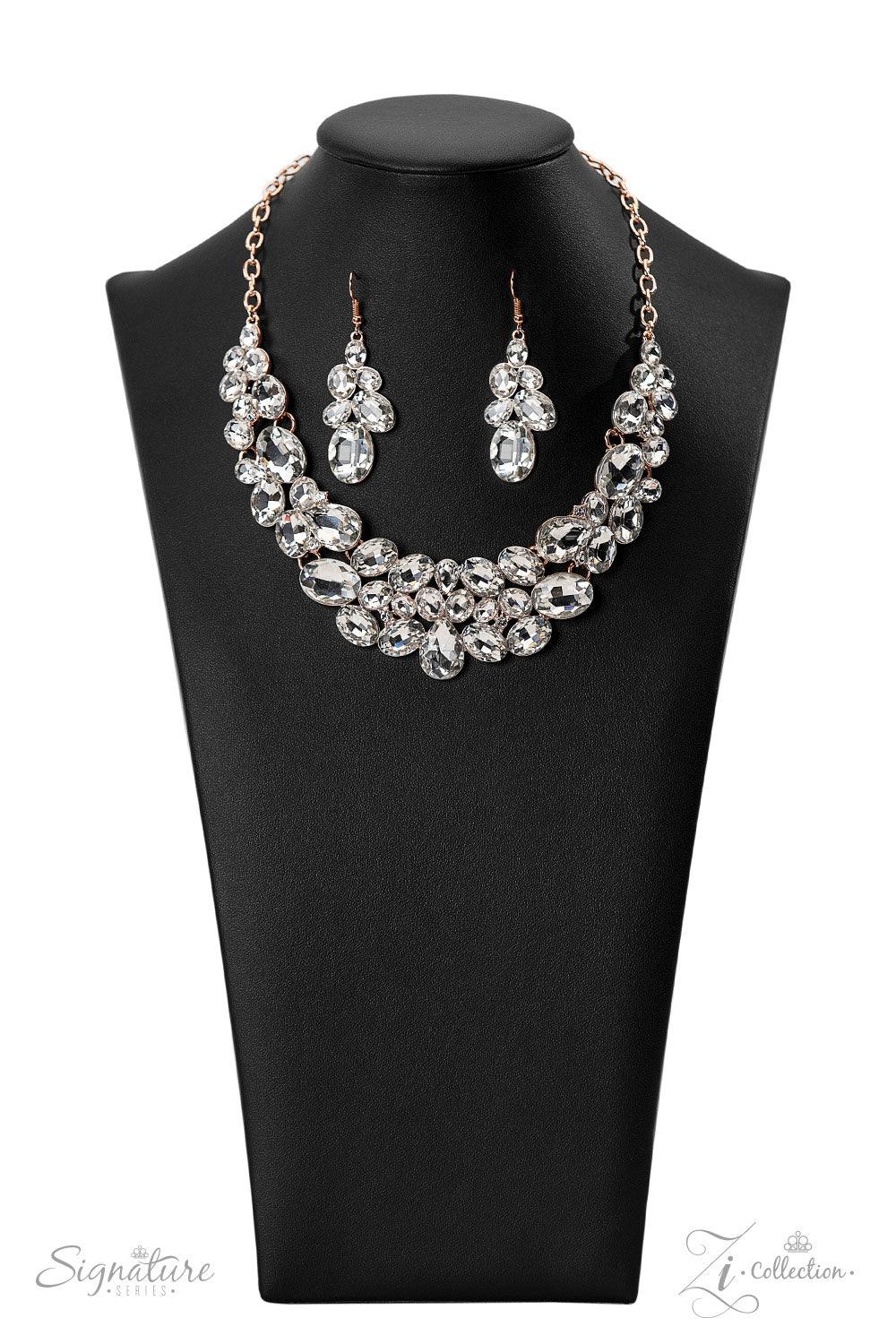Paparazzi Accessories The Jenni Oversized white rhinestones with exaggerated faceted surfaces gather into glittery clusters along the collar. A teardrop-shaped gem sits front-and-center, inviting the eye to explore the scattered shapes throughout the desi