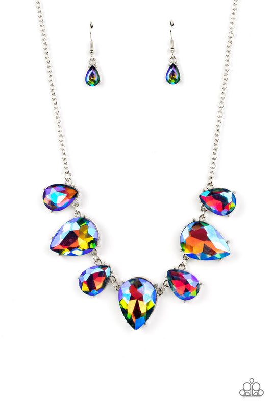 Paparazzi Accessories Otherworldly Opulence - Multi 1 Featuring a stellar iridescence, an oversized collection of glittery blue teardrop gems alternates upside down and right-side up below the collar for an out-of-this-world sparkle. Features an adjustabl