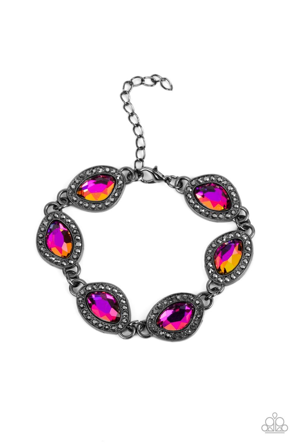 Paparazzi Accessories Next-Level Sparkle - Multi Bordered in gunmetal frames dotted with tiny flecks of hematite rhinestones, a collection of asymmetrical gems coated in an oil-spill finish delicately link into a spellbinding sparkle around the wrist. Fea