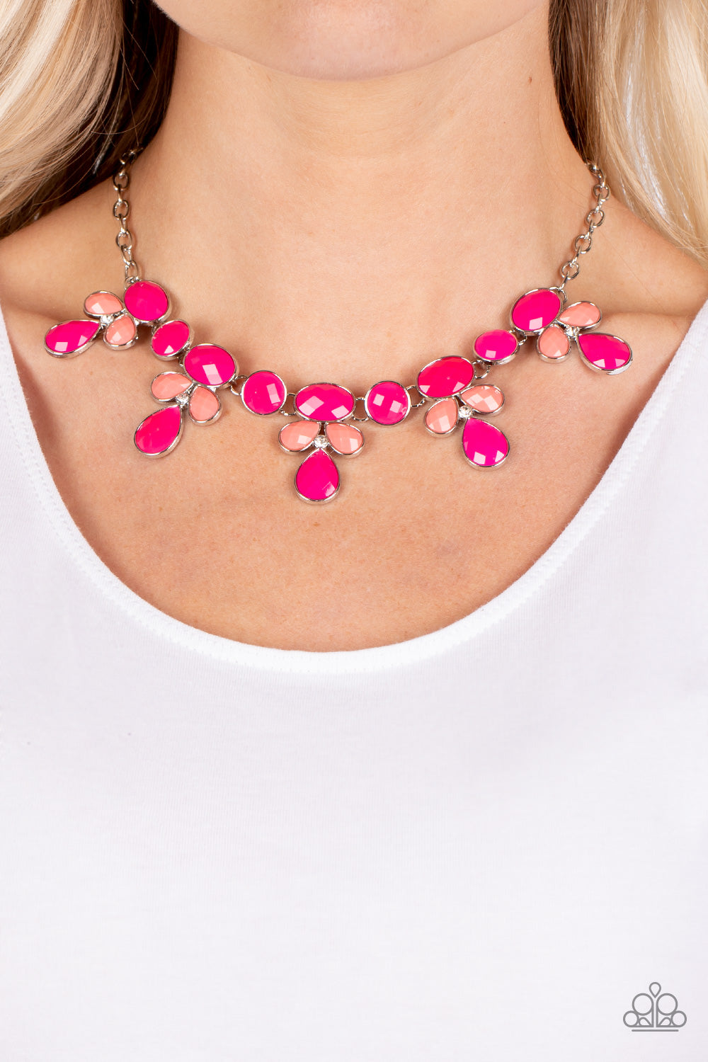 Paparazzi Accessories Midsummer Meadow - Pink Featuring dizzying faceted finishes, a collection of oval, round, and teardrop shaped beads in vibrant shades of coral and Pink Peacock cluster into colorful frames around dainty white rhinestones. The whimsic