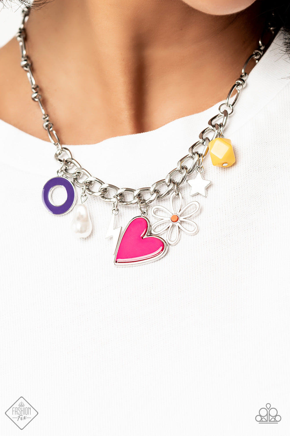 Paparazzi Accessories Living in CHARM-ony - Multi Elongated silver chain links, separated by tiny silver beads, lead down the neckline to a section of thick, flat, silver curb chain. A collection of whimsical charms gather along the thicker chain, includi