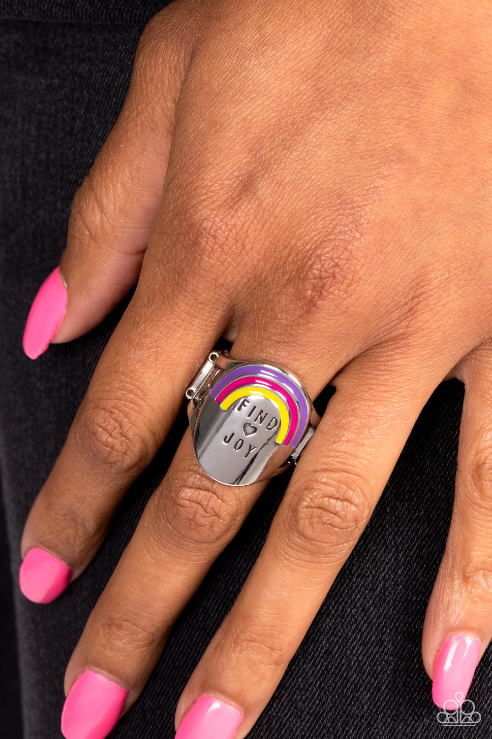 Paparazzi Accessories Rainbow of Joy - Multi A silver oval disc is stamped with the phrase "Find Joy", as a tiny heart outline separates the two words. Colorful bands of Pink Peacock, Samoan Sun, and purple curve above the phrase, creating three arcs of a
