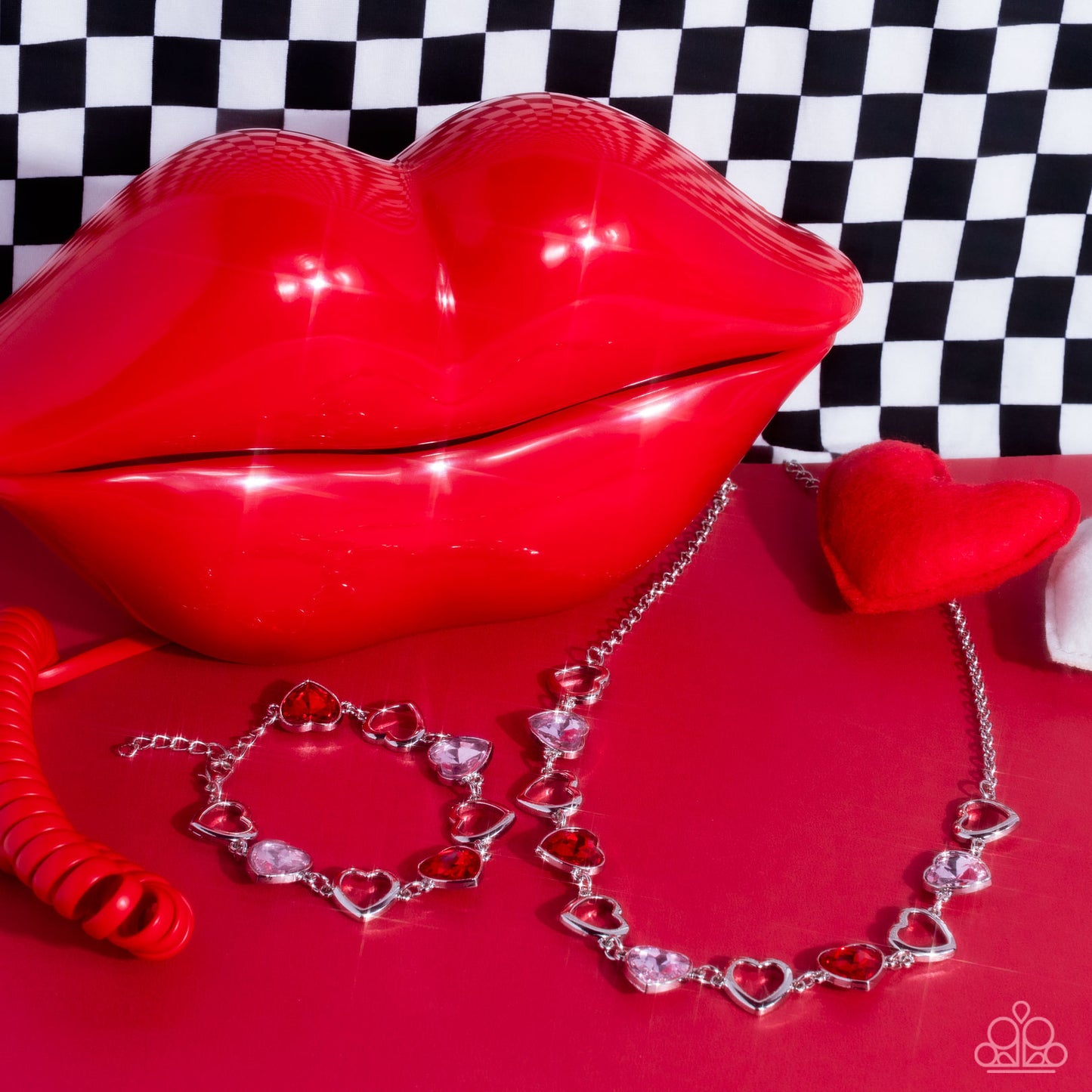 Paparazzi Accessories Contemporary Cupid - Multi Shiny, silver silhouette hearts alternate between faceted red and pink heart gems pressed into silver frames.The high-sheen and sparkly display coalesce around the collar for a cupid-like charm. Features an