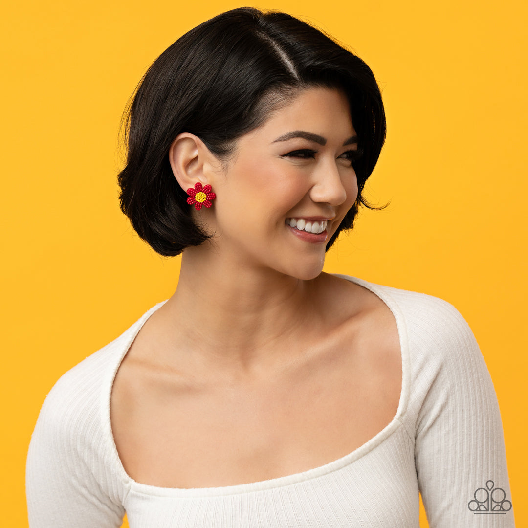 Paparazzi Accessories Sensational Seeds - Red Layers of red seed bead petals fan out from a yellow seed bead center, blooming into a textured floral centerpiece. Earring attaches to a standard post fitting. Sold as one pair of post earrings. Jewelry
