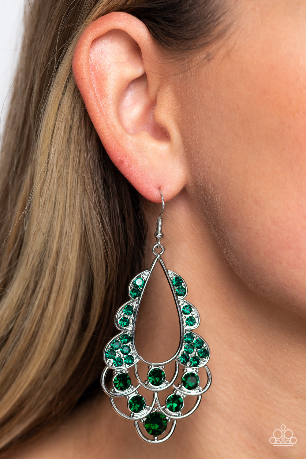 Paparazzi Accessories Majestic Masquerade - Green Airy loops of high-sheen silver, dotted with glittery emerald faceted gems, ripple out from an airy teardrop shape. Some curls feature solitaire oversized gems, while others feature a dainty collection res