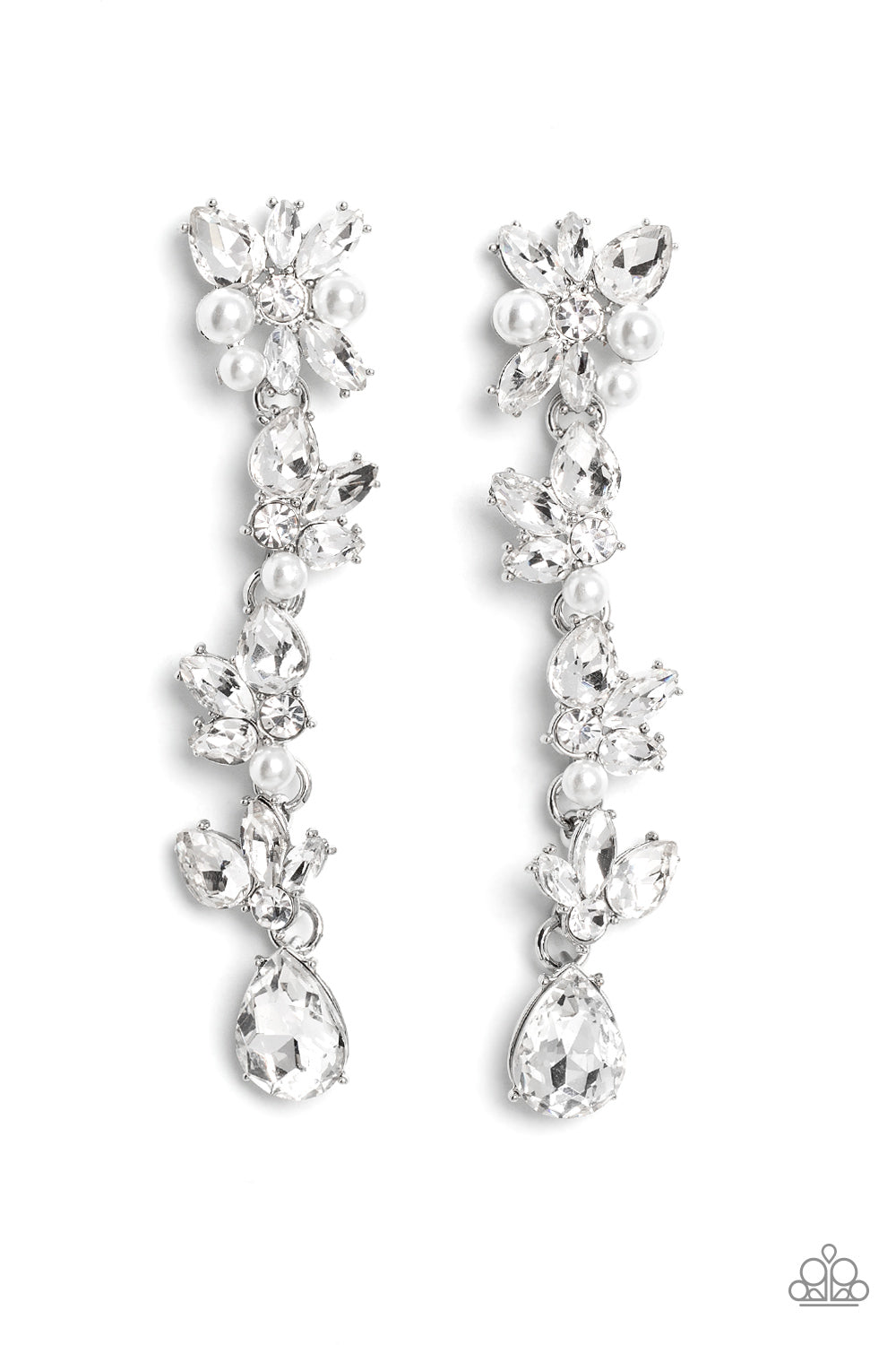 Paparazzi Accessories LIGHT at the Opera - White Radiant clusters of white reflective teardrop, marquise-cut and round gems combine with classic white pearls to create an explosion of glitz that extends down the ear. Hanging from the bottom of the light-r