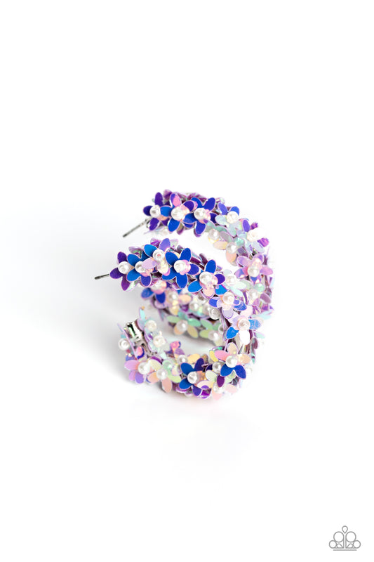 Paparazzi Accessories Fairy Fantasia - Purple A floral explosion, encompassing the entirety of a thick silver hoop, features reflective lavender flowers dotted with dainty pearl centers for a dreamy, whimsicality below the ear. Earring attaches to a stand