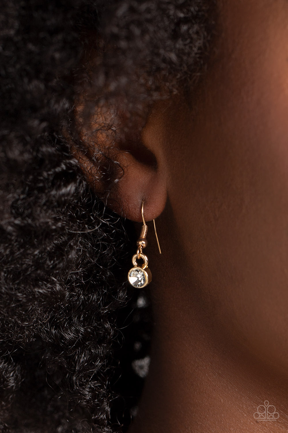 Paparazzi Accessories State of the HEART - Gold Nestled in white rhinestone frames, a trio of glittery iridescent heart-shaped gems delicately links and dangles down the neckline for a dash of swoon-worthy shimmer on a gold chain. Features an adjustable c