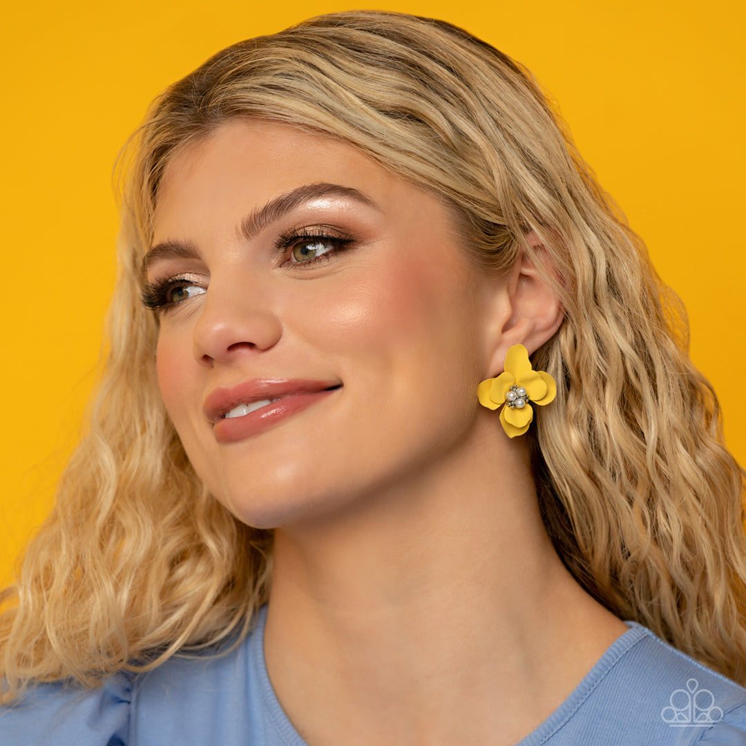 Paparazzi Accessories Jovial Jasmine - Yellow Blooming from a dainty white pearl and studded center, yellow petals flare out around the ear in a delicate, airy manner for a feminine finish. Earring attaches to a standard post fitting. Sold as one pair of