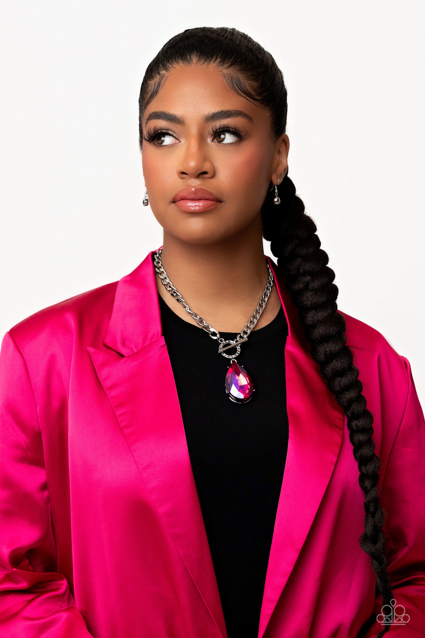 Paparazzi Accessories Edgy Exaggeration - Pink Featuring an elegant lariat closure, an oversized, faceted, stellar pink UV shimmery teardrop gem, encased in an elevated pronged silver frame cascades from the bottom of a silver curb chain in a whimsical fa