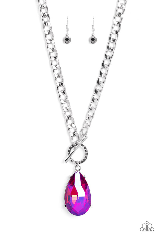 Paparazzi Accessories Edgy Exaggeration - Pink Featuring an elegant lariat closure, an oversized, faceted, stellar pink UV shimmery teardrop gem, encased in an elevated pronged silver frame cascades from the bottom of a silver curb chain in a whimsical fa