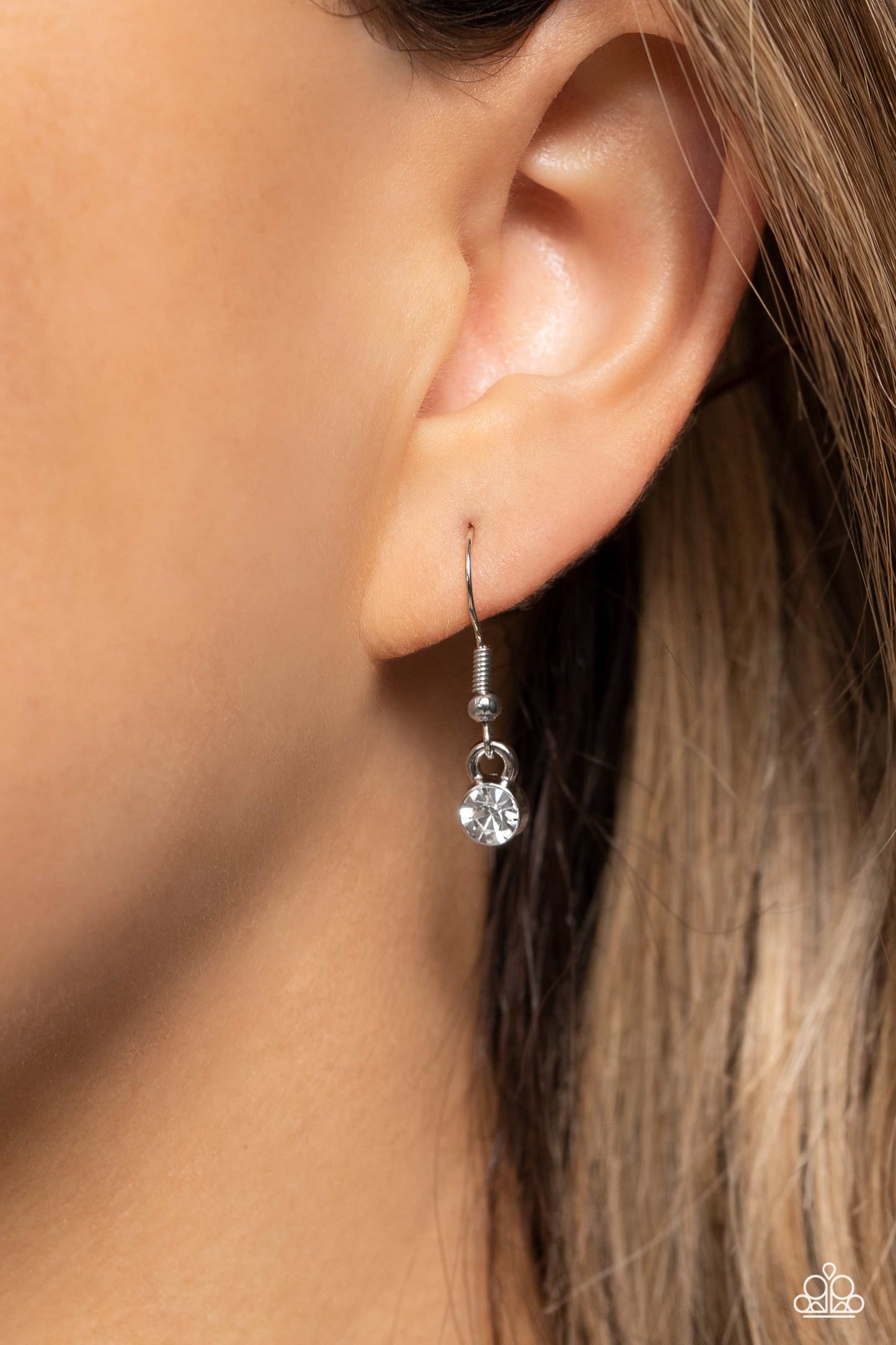 Paparazzi Accessories Swimming in Sparkles - Multi An eclectic collection of white, blue, iridescent and light peach round rhinestones in varying sizes and marquise-cut gems in a light pink shade cluster around the collar in high-sheen silver frames. Patt