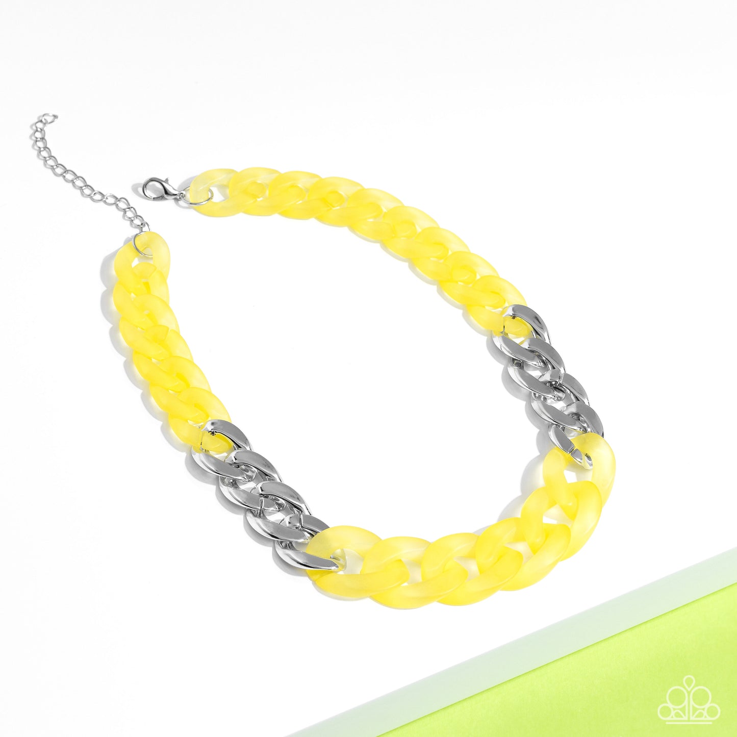 Paparazzi Accessories Curb Your Enthusiasm - Yellow Brushed in a vibrant Empire Yellow finish, a strand of acrylic curb chain combines with links of a silver curb chain to dramatically drape across the chest for a whimsical yet bold look. Features an adju