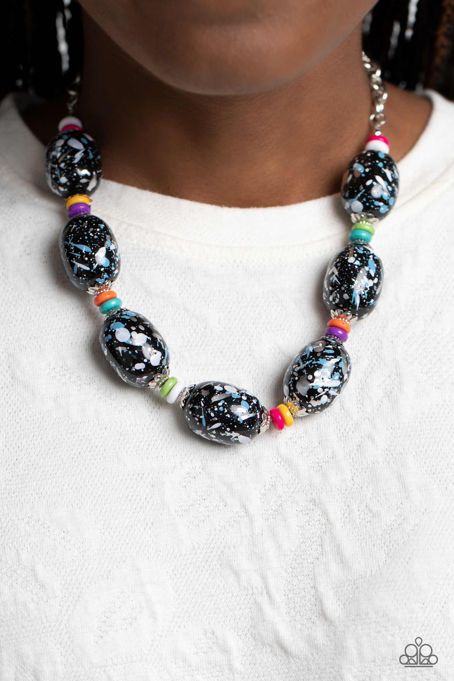 Paparazzi Accessories No Laughing SPLATTER - Multi Featuring blue, white, and silver paint splatter, oversized black beads loop around the collar from a classic silver link chain. Silver floral fittings and small discs in shades of white, hot pink, yellow