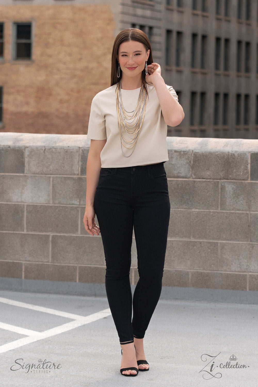 Paparazzi Accessories The Linda Strand after strand of sleek, flat, snake chain cascade down the chest in dreamy defiance. Alternating in flawless finishes of silver and gold, each metallic tier extends a little farther than the last, building into a mixe