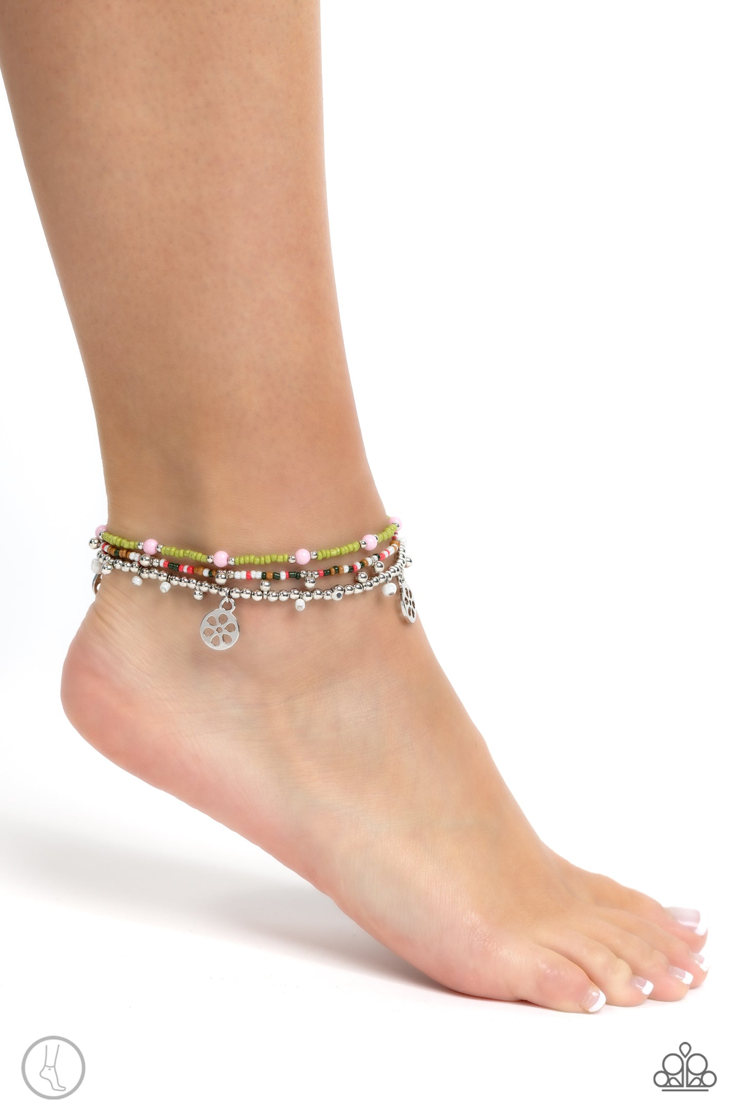 Paparazzi Accessories Surfing Safari - Green Infused with hints of Leek Green, Macchiato, coral and olive seed beads, a mismatched collection of silver beads, stenciled silver floral discs, dainty white pearl seed beads and baby pink beads are threaded al