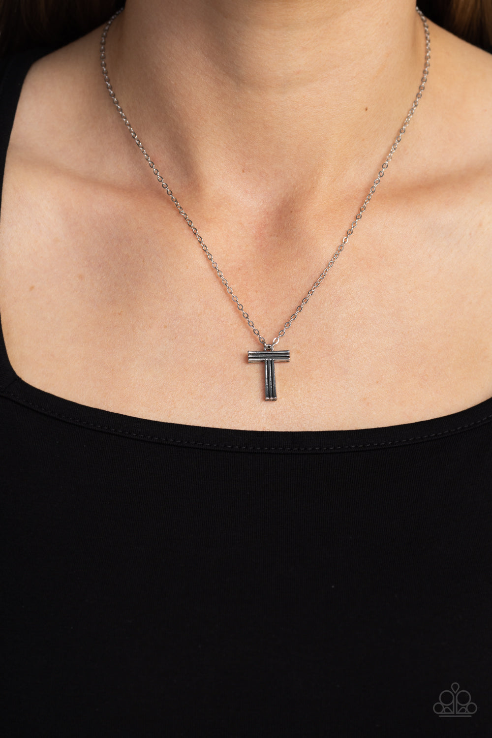 Paparazzi Accessories Leave Your Initials - Silver - T Etched in linear texture, a silver letter "T" hovers below the collar from a dainty silver chain, for a sentimentally simple design. Features an adjustable clasp closure. Sold as one individual neckla