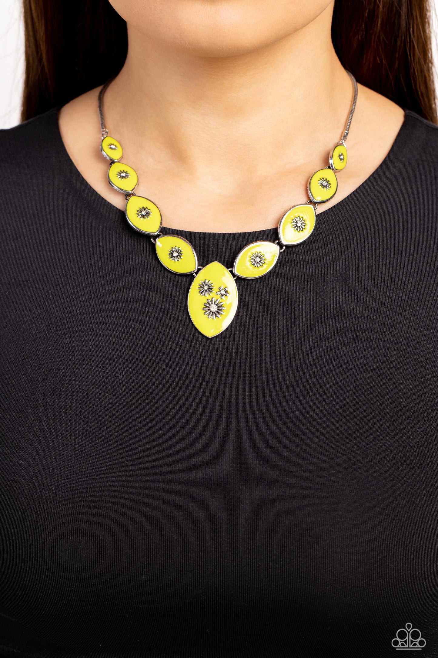 Paparazzi Accessories Pressed Flowers - Green Featuring vibrant Love Bird paint, a collection of silver marquise-shaped frames gradually increase in size as they taper below the collar in a timeless fashion on a silver snake chain. Each frame is embossed