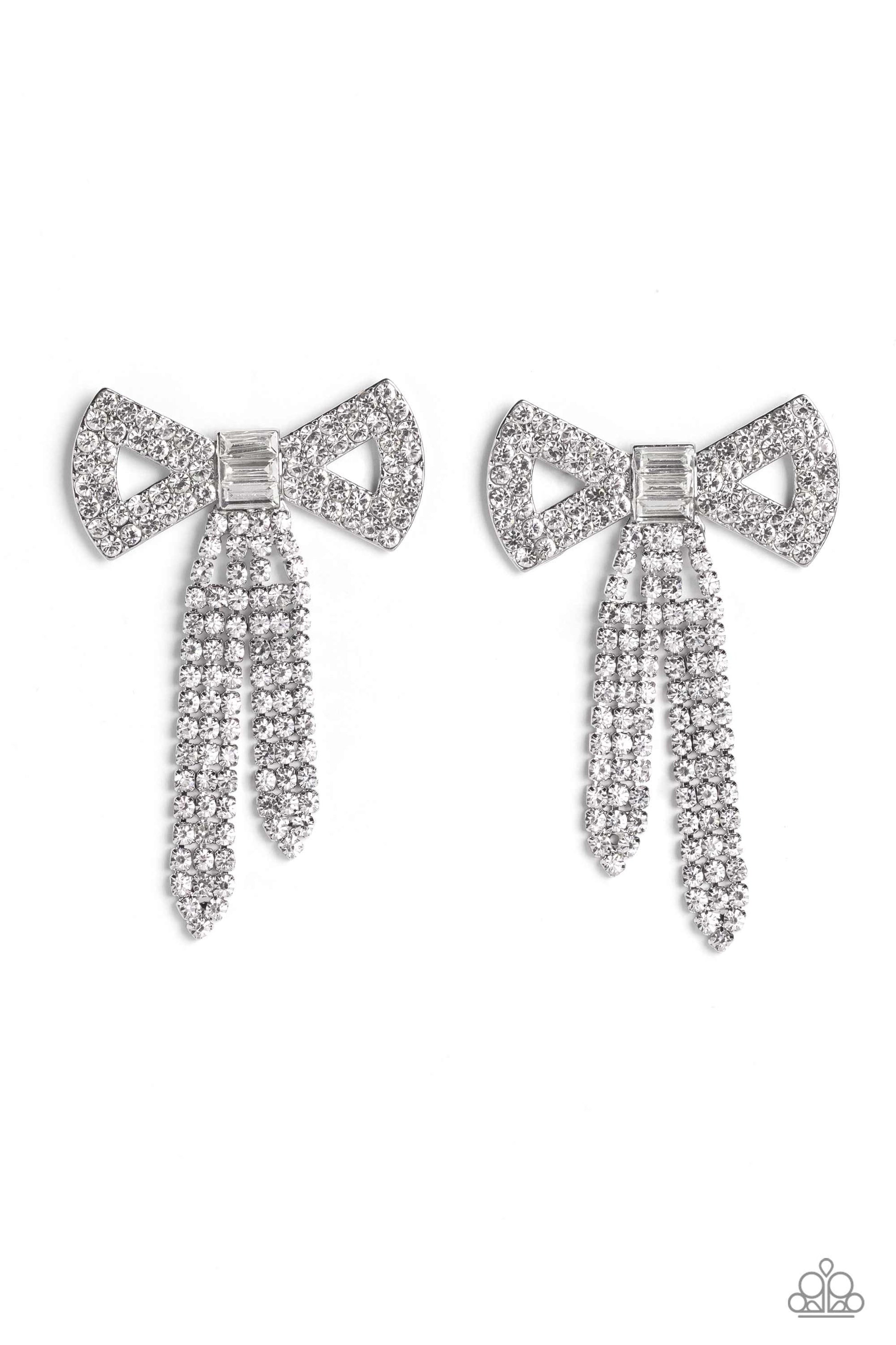 Paparazzi Accessories Just BOW With It - White Featuring silver square fittings, high-sheen bands of silver, adorned in sparkling white rhinestones loop into a stunning bow charm, creating a classy statement at the ear. Featured in the center of the class