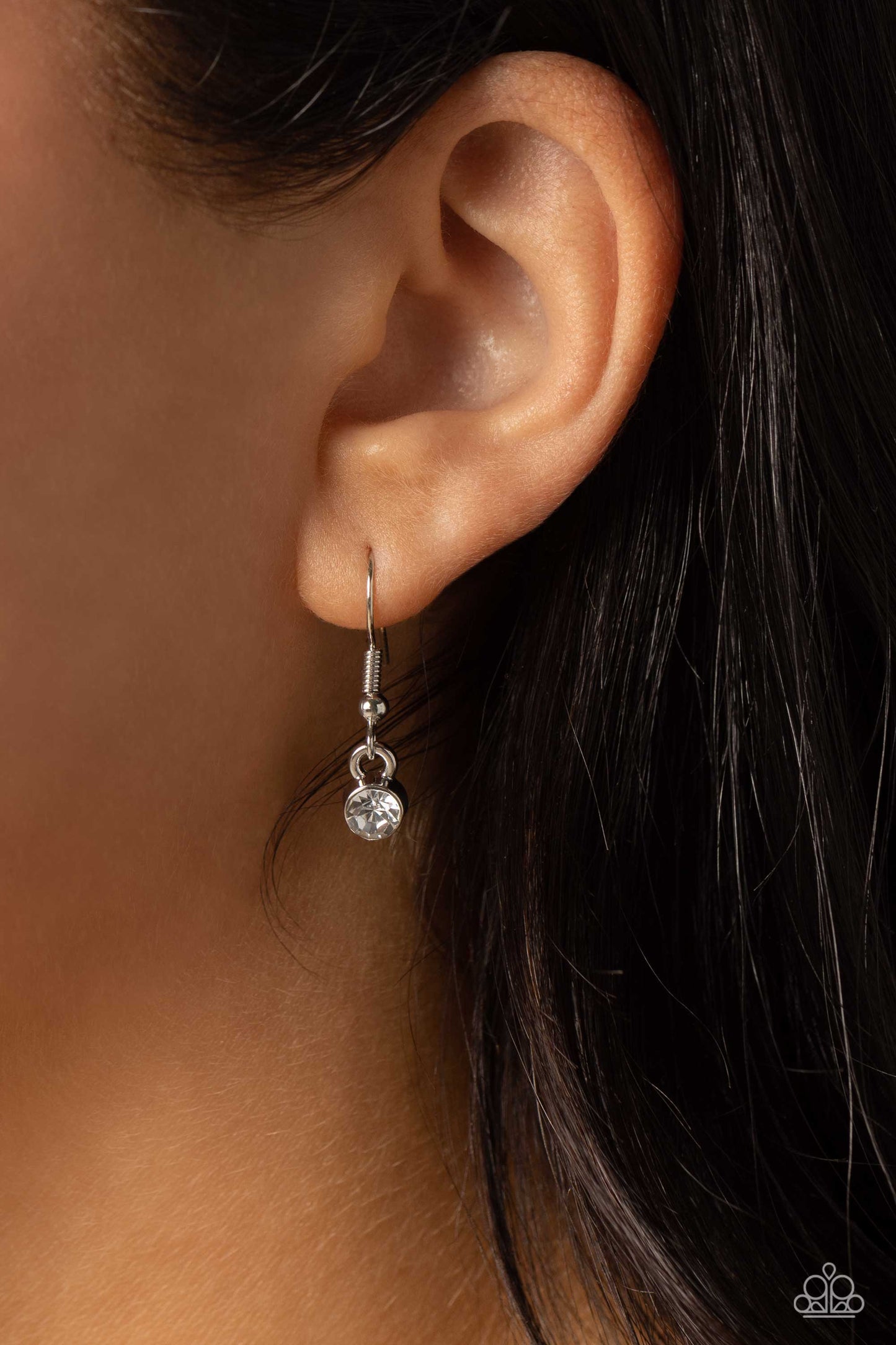 Paparazzi Accessories INITIALLY Yours - J - White Embossed with dainty white rhinestones, a silver letter "J" hovers below the collar from a dainty silver chain, for a sentimentally simple design. Features an adjustable clasp closure. Sold as one individu