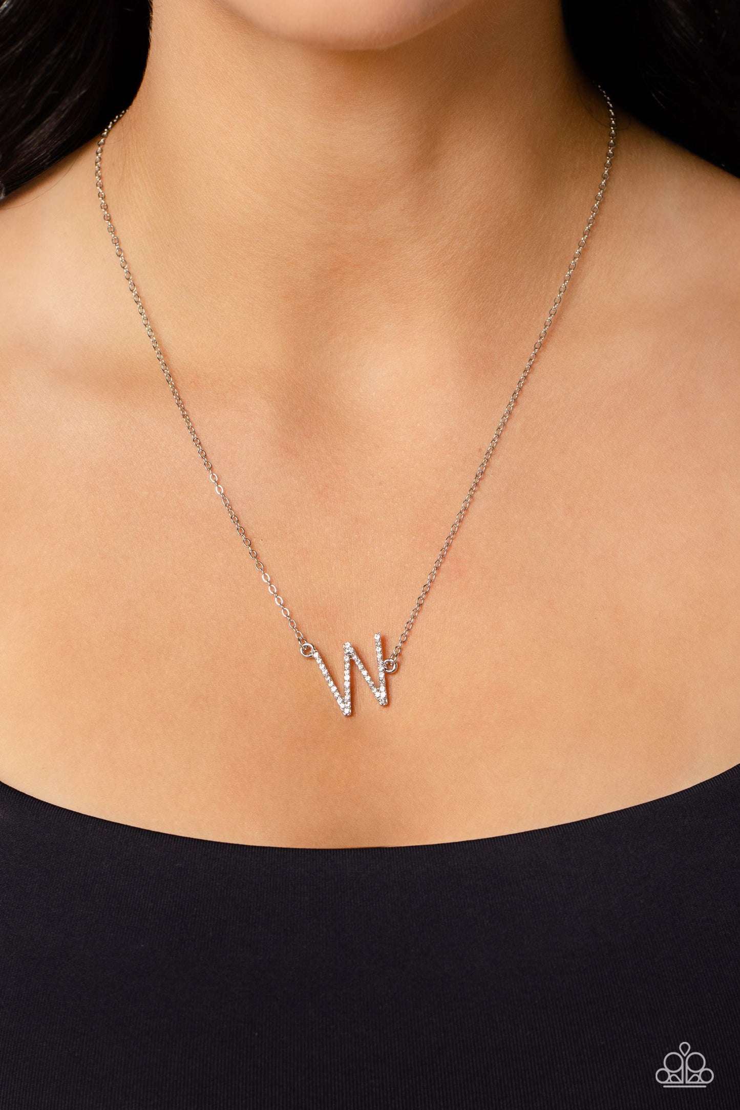 Paparazzi Accessories INITIALLY Yours - W - White Embossed with dainty white rhinestones, a silver letter "W" hovers below the collar from a dainty silver chain, for a sentimentally simple design. Features an adjustable clasp closure. Sold as one individu