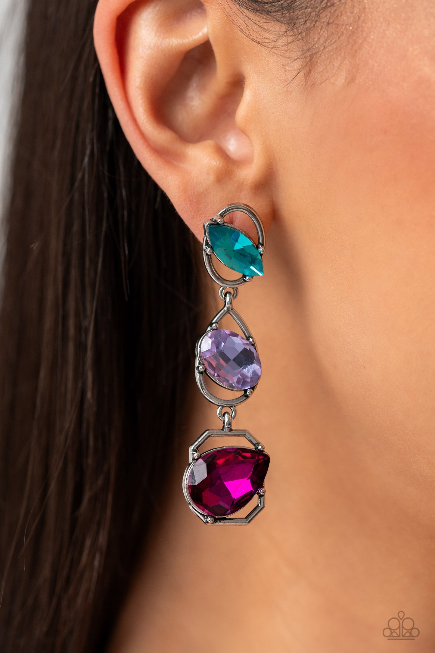 Paparazzi Accessories Dimensional Dance - Multi Linking together to create a geometric lure, a sleek silver oval, teardrop, and emerald-cut frame cascade down the ear. Slanted sideways in pronged settings across each frame, a fuchsia teardrop, purple oval