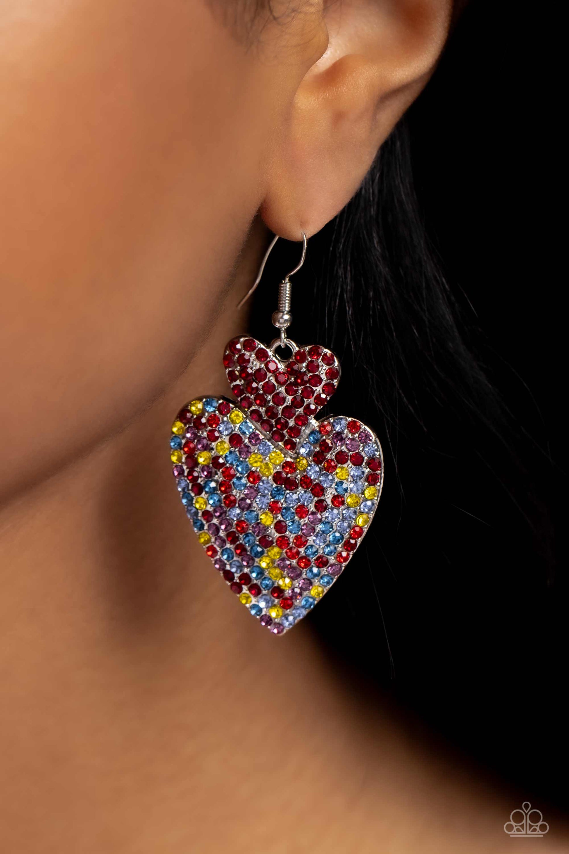 Paparazzi Accessories Flirting Flourish - Red Embossed in dainty rhinestones, a red rhinestone-covered silver heart frame delicately links with a larger silver heart frame featuring red, light red, blue, yellow, and pink rhinestones for a flirtatiously vi