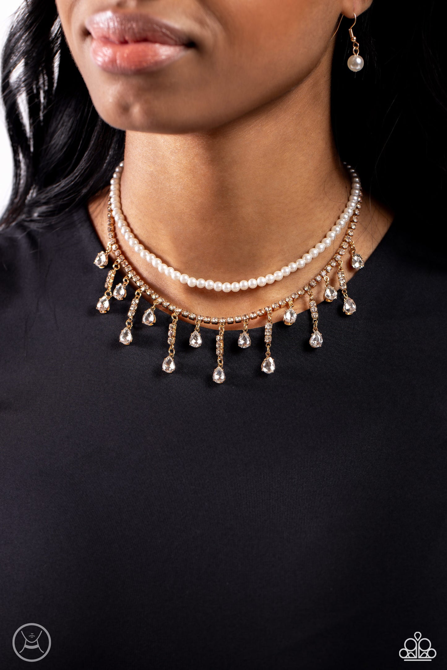 Paparazzi Accessories Lessons in Luxury - Gold Featuring a white rhinestone square-fitting chain, white teardrop-cut gems, bordered in gold pronged fittings, swing from streams of glittery rhinestones while solitaire teardrop gems drip in an alternating p