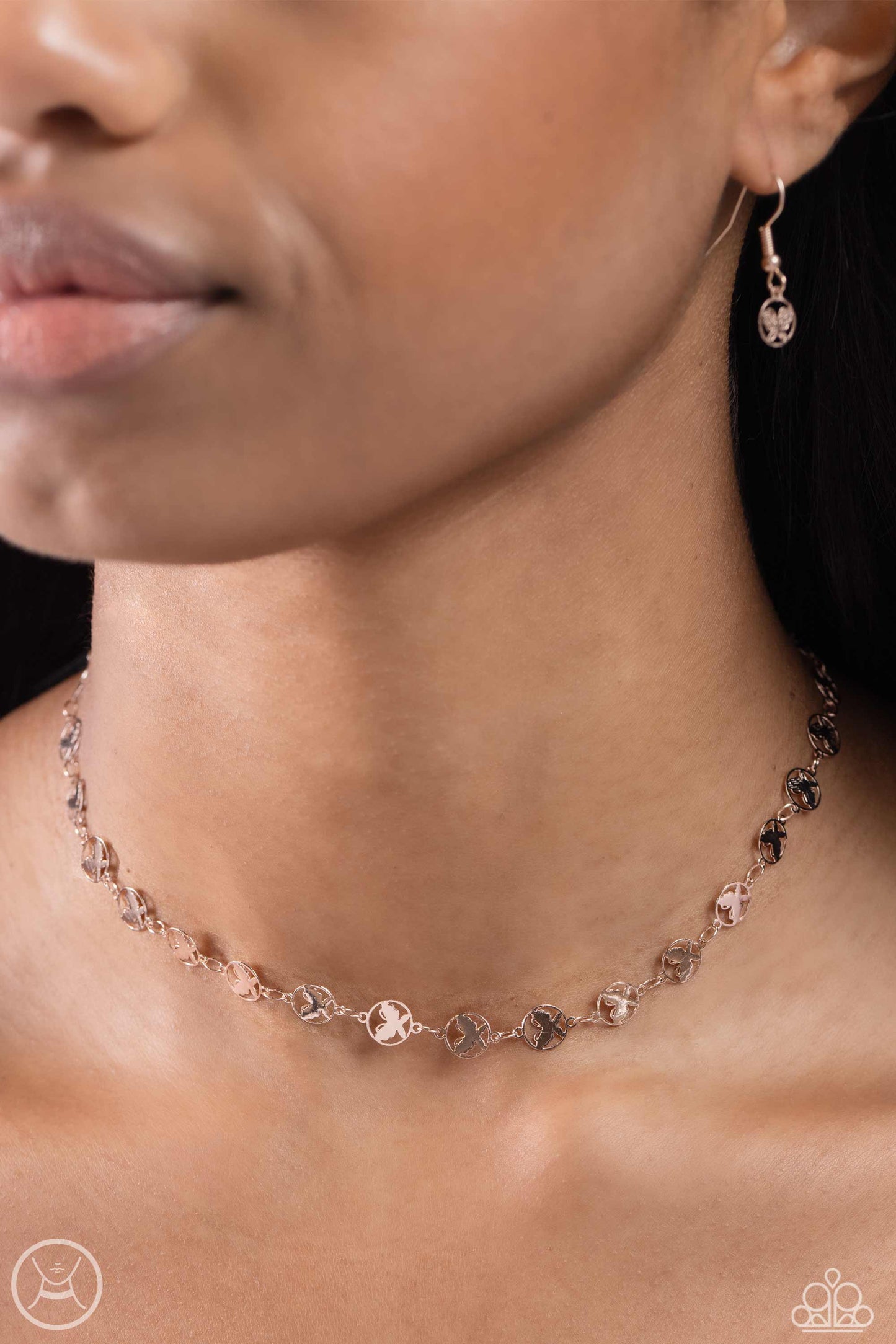 Paparazzi Accessories Fluttering Festival - Rose Gold Dainty rose gold butterfly charms, embedded in airy circles, are threaded around the collar creating a whimsical statement. Features an adjustable clasp closure. Sold as one individual choker necklace.