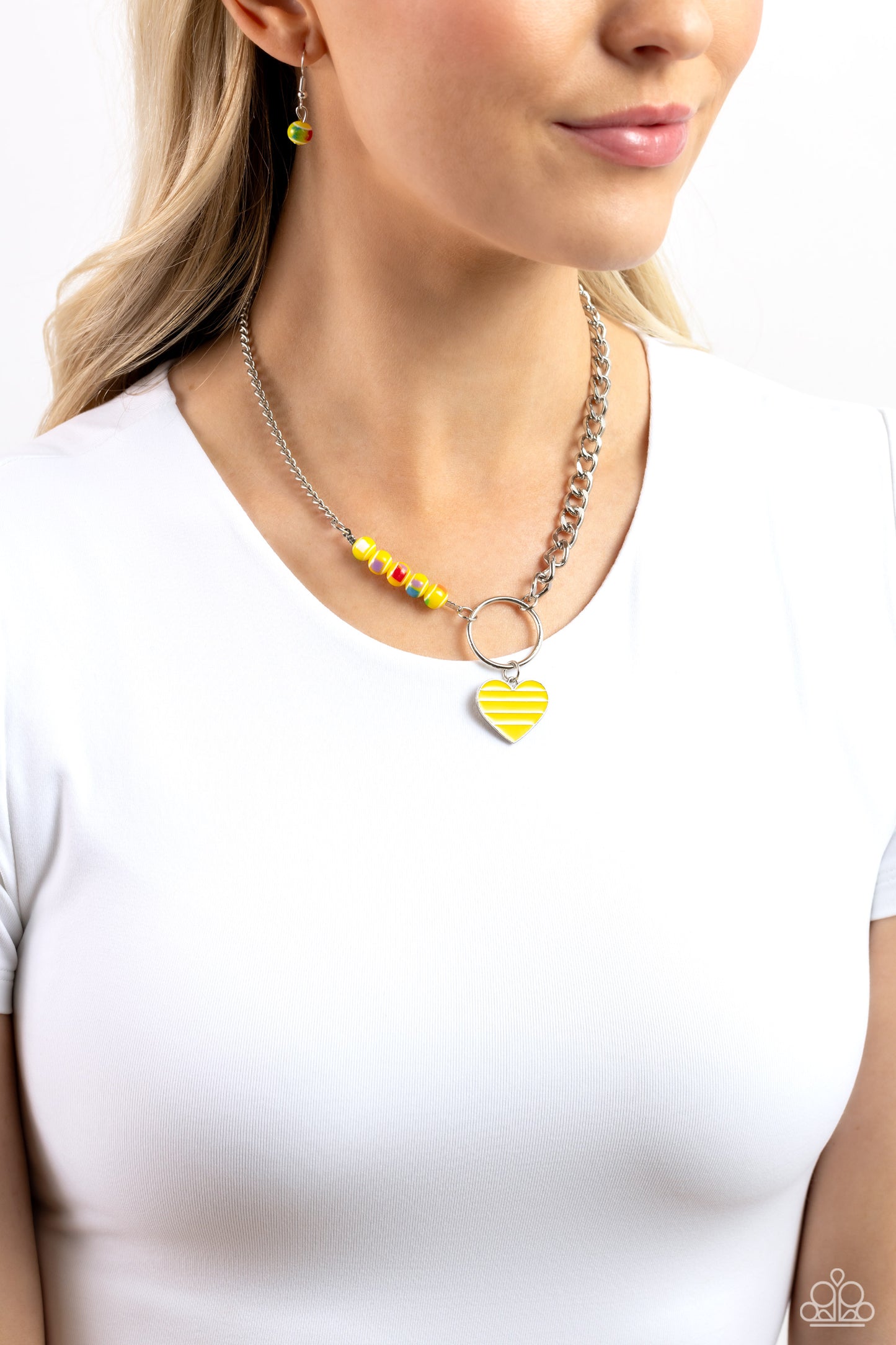 Paparazzi Accessories Mismatched Mayhem - Yellow A strand of flat silver curb chain collides with a classic chain and a vivacious collection of yellow beads, featuring various multicolored splatters across its surface, to create an abstract blend of color