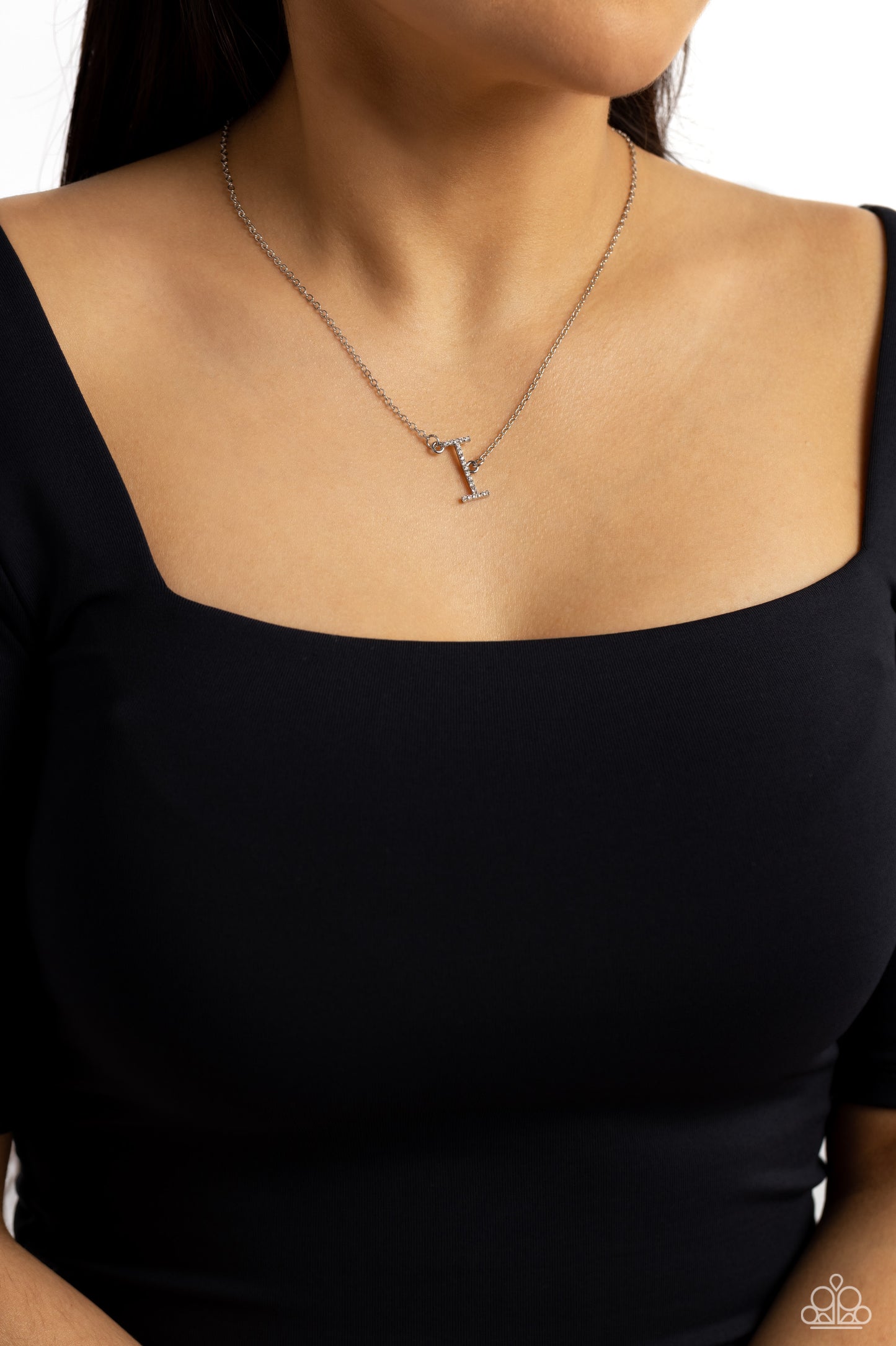 Paparazzi Accessories INITIALLY Yours - I - White Embossed with dainty white rhinestones, a silver letter "I" hovers below the collar from a dainty silver chain, for a sentimentally simple design. Features an adjustable clasp closure. Sold as one individu