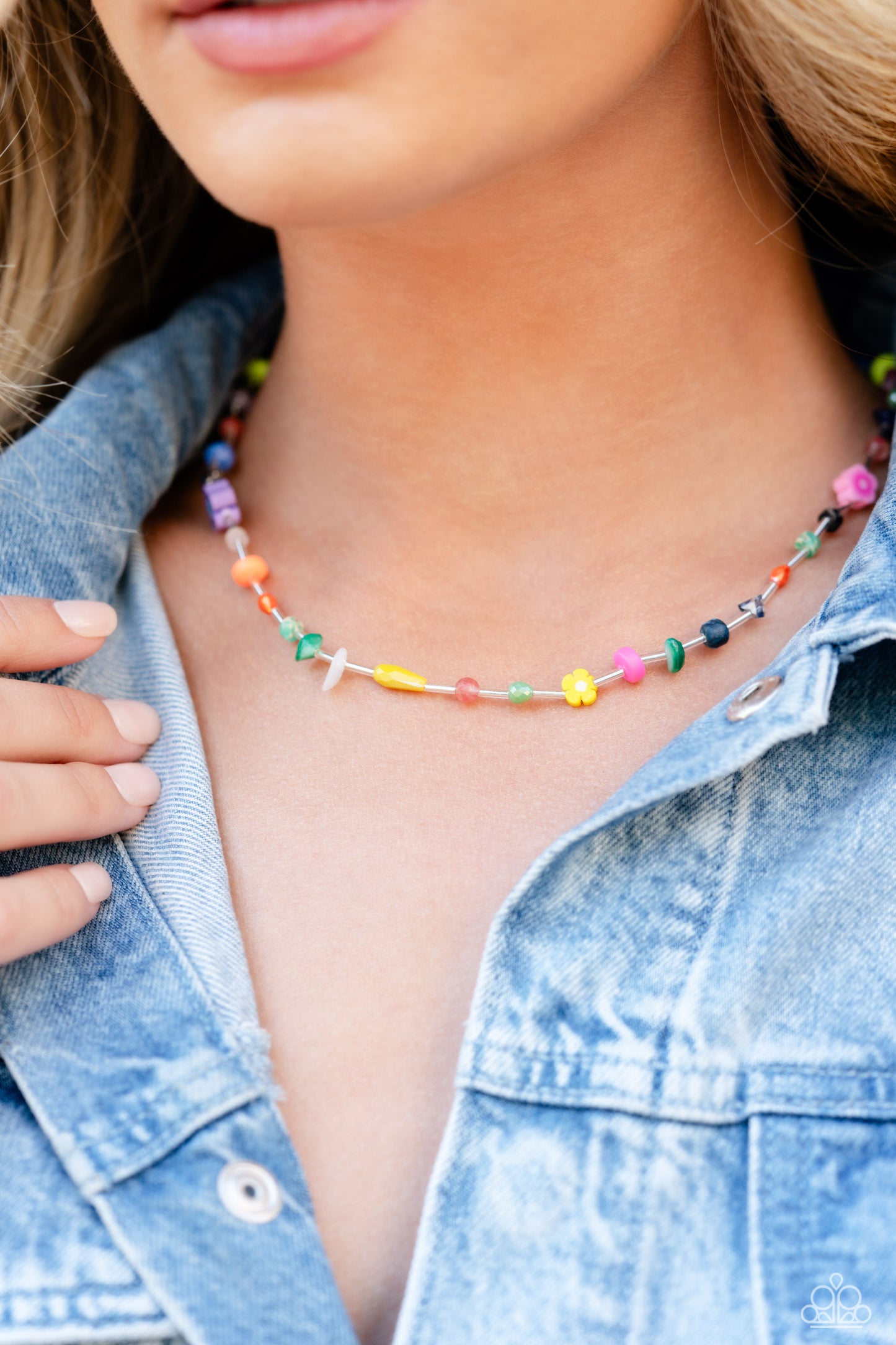 Paparazzi Accessories Ambitious Assortment - Multi Infused on an invisible wire, an assortment of multicolored beads, acrylics, and chiseled stones alternating with dainty silver rods coalesce around the neckline for a youthful pop of color. Features an a