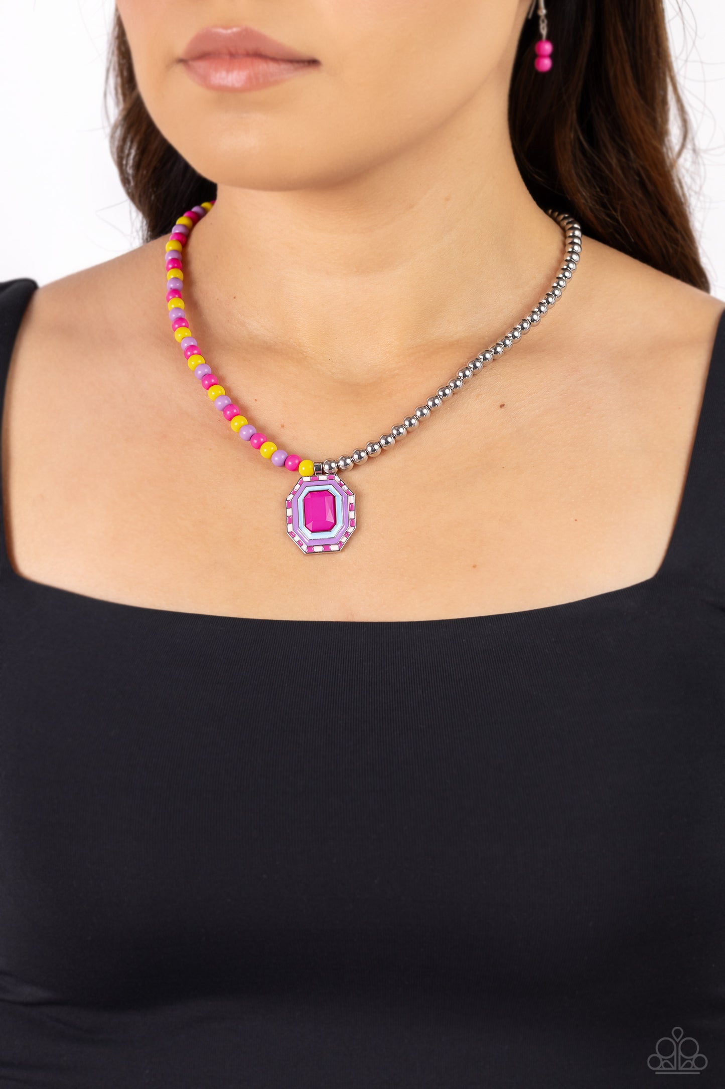 Paparazzi Accessories Contrasting Candy - Multi A strand of silver beads collides with High Visibility, lavender, and Fuchsia Fedora glossy beads that lay on the opposite side to create a contrasting blend of color and sheen. An oversized emerald-cut pend