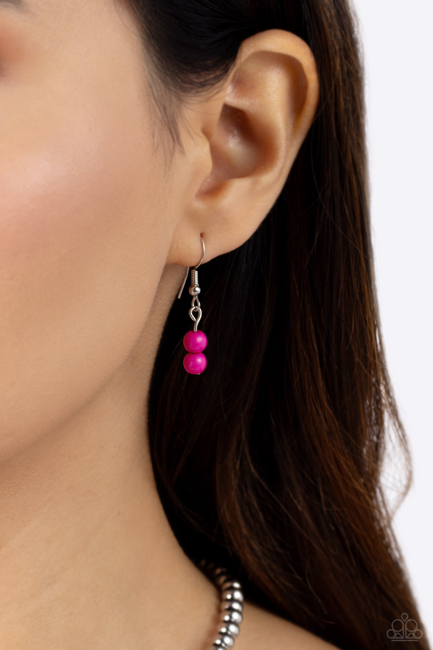 Paparazzi Accessories Contrasting Candy - Multi A strand of silver beads collides with High Visibility, lavender, and Fuchsia Fedora glossy beads that lay on the opposite side to create a contrasting blend of color and sheen. An oversized emerald-cut pend