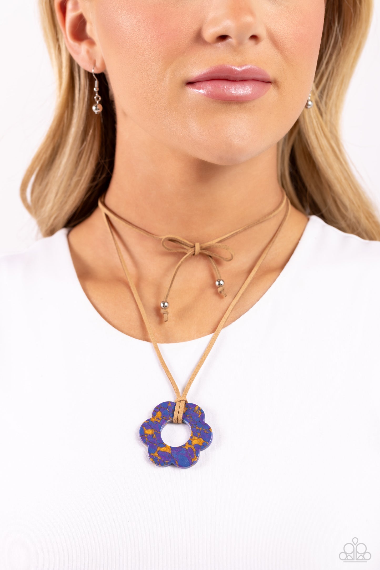 Paparazzi Accessories Tied Triumph - Multi Featuring purple and brown marbling, an airy blue flower is knotted at the bottom of a lengthened strand of brown suede for a southwestern-inspired statement. Features an adjustable tie closure. Sold as one indiv
