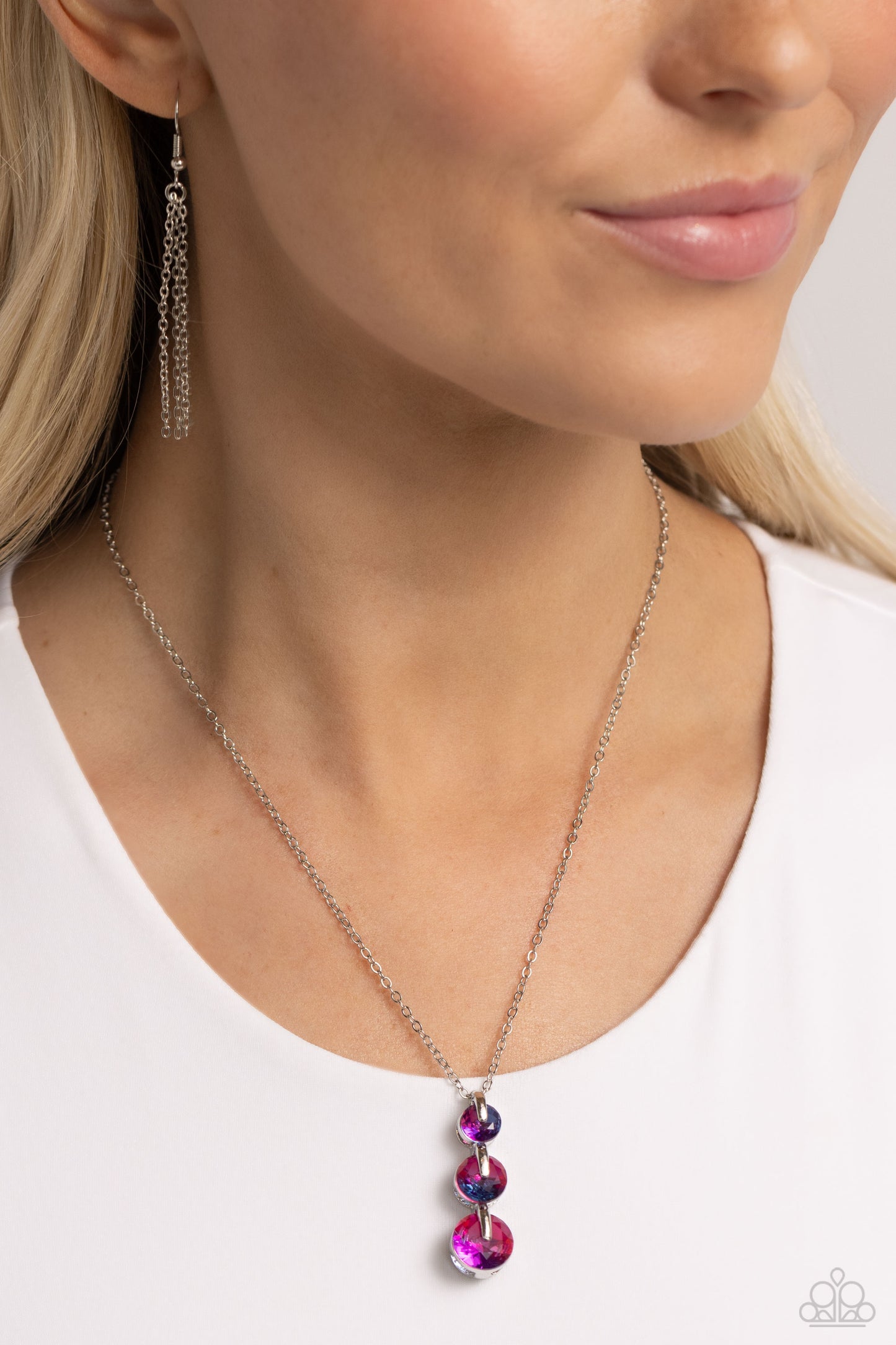 Paparazzi Accessories Ombré Obsession - Multi Featuring a UV finish, a collection of blue, purple, and pink gems are set in elevated, pronged silver fittings as they gradually increase in size along a dainty silver chain to create a prismatic, ombré displ