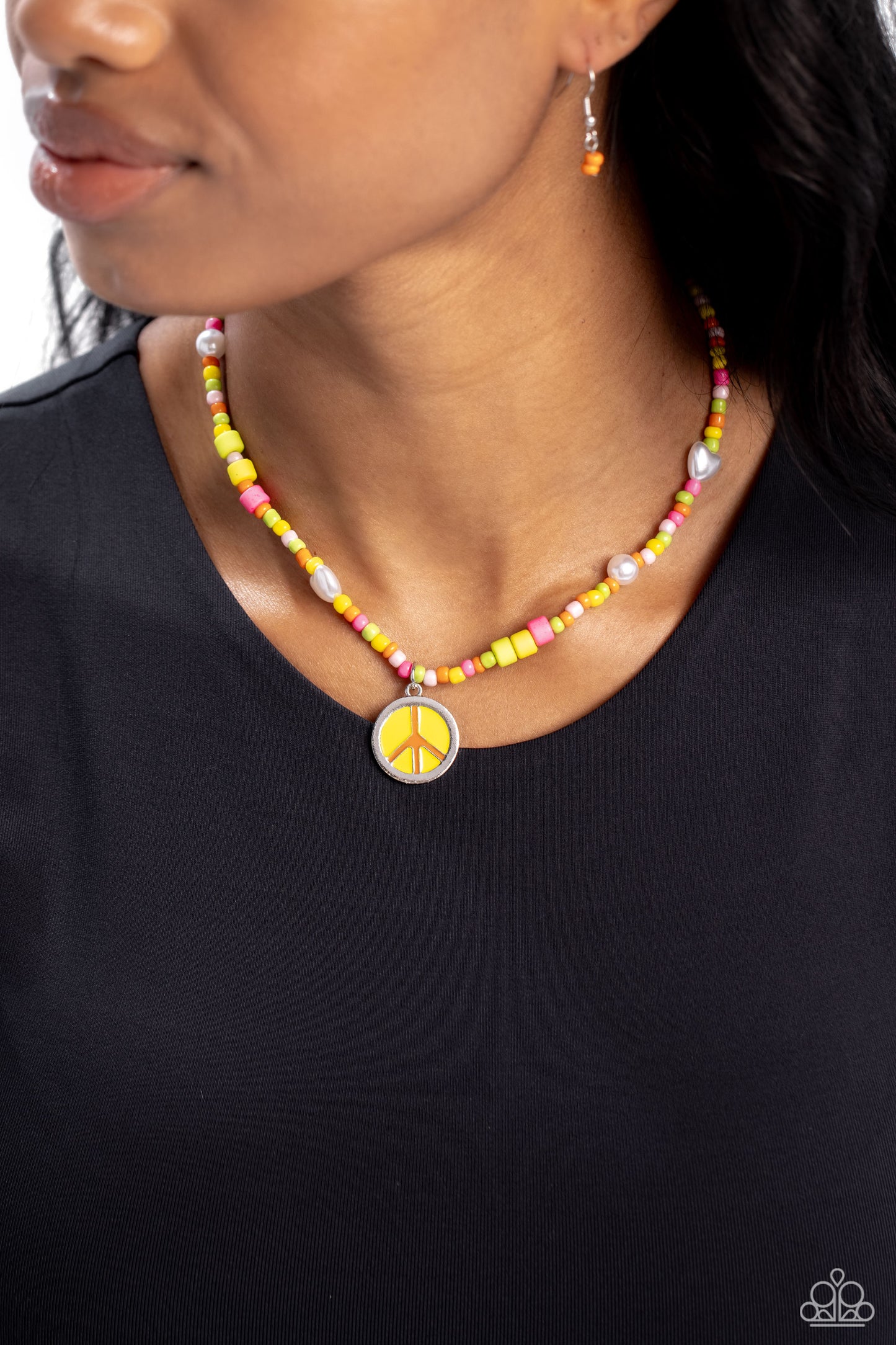 Paparazzi Accessories Pearly Possession - Multi Infused along an invisible string, yellow, green, orange, white, and pink seed beads combine with sporadically placed multicolored discs, and glossy white and heart-shaped pearls for a vibrant pop of color a
