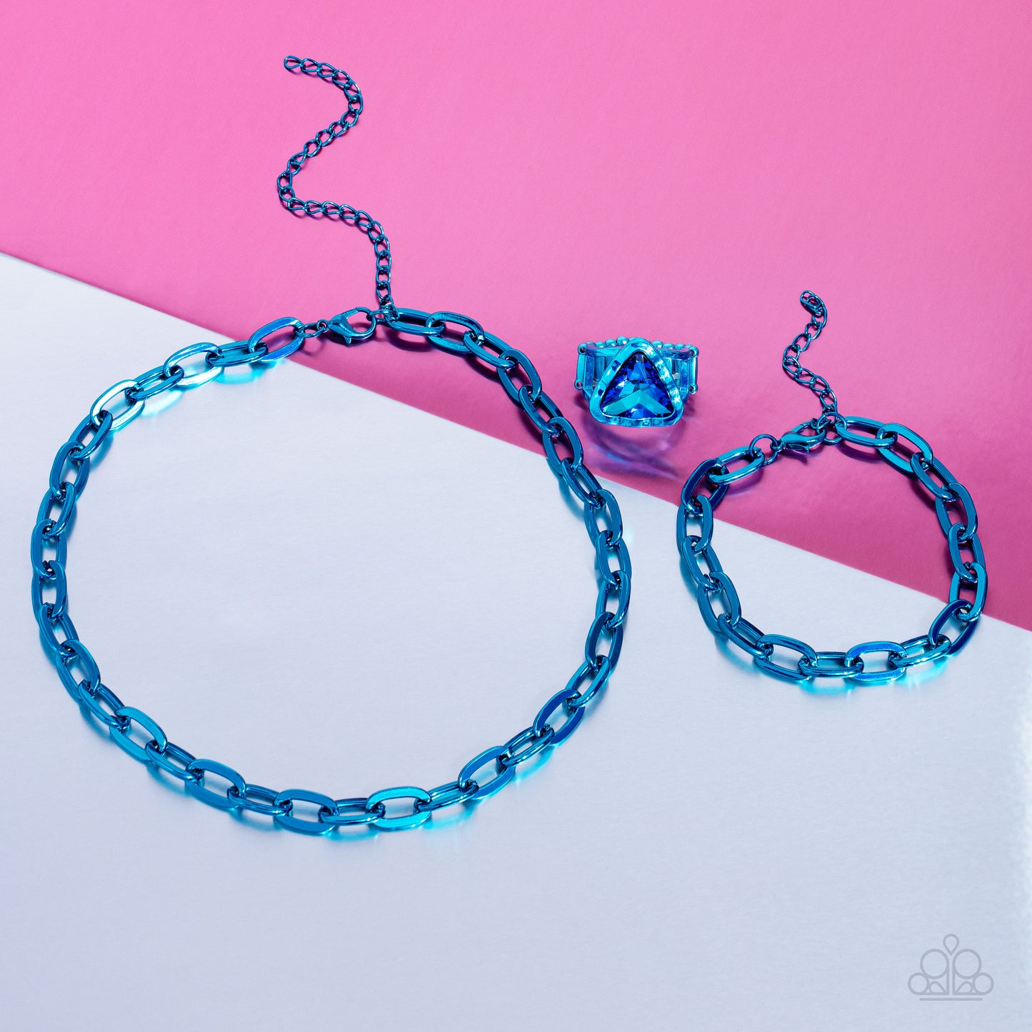 Paparazzi Accessories Triangle Tyrant - Blue Featuring a UV shimmer, a blue triangle-cut gem is pressed into a scalloped triangular electric blue frame set atop a thin, airy band for a colorfully gritty look. Features a stretchy band for a flexible fit. S