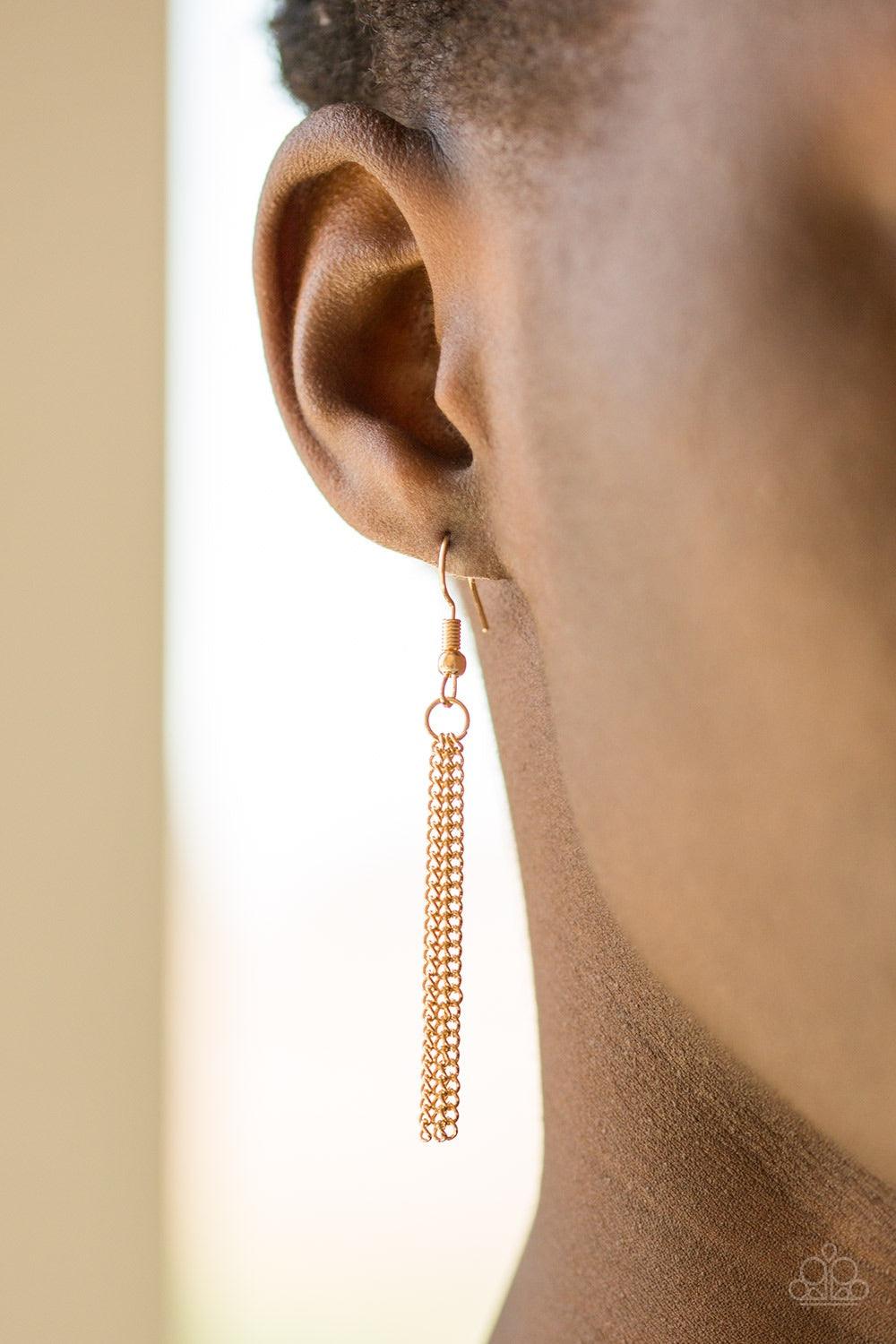 Paparazzi Accessories Fiercely Fall - Gold An elongated gold chain gives way to a rippling gold leaf-like pendant for a seasonal look. Features an adjustable clasp closure. Jewelry