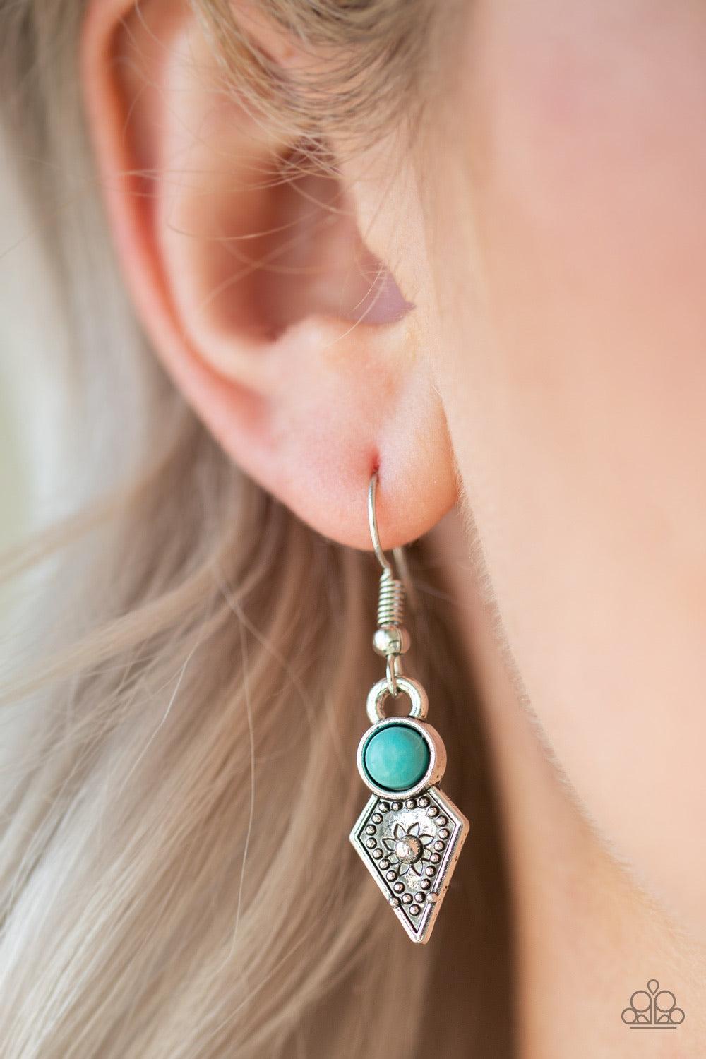 Paparazzi Accessories Jurassic Jamboree - Blue Featuring studded detail and refreshing turquoise stone accents, mismatched silver frames swing from the bottom of a bold silver chain, creating a flirty fringe below the collar. Features an adjustable clasp