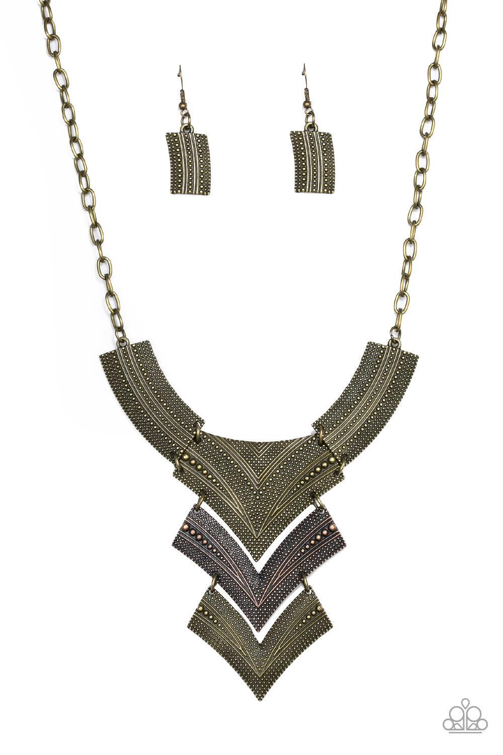 Paparazzi Accessories Fiercely Pharaoh - Multi Radiating in studded details, antiqued brass and copper plates link below the collar, joining into a fierce geometric pendant. Features an adjustable clasp closure. Sold as one individual necklace. Includes o