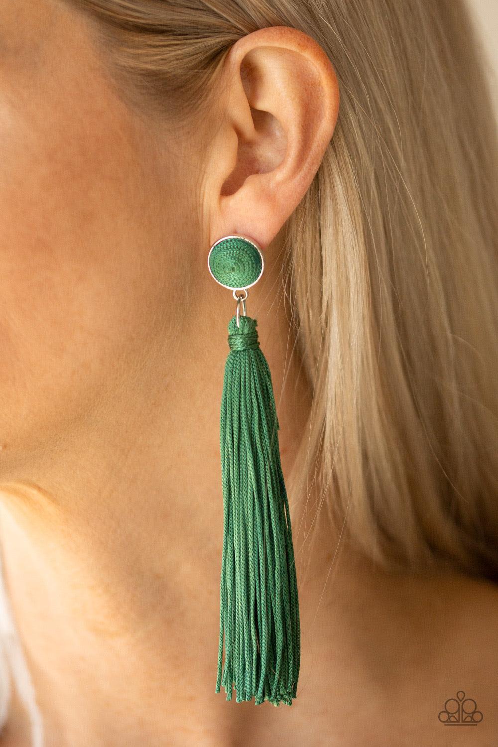 Paparazzi Accessories Tightrope Tassel - Green A tassel of shiny green cording swings from the bottom of a matching green threaded button-top frame for a flirtatious fashion. Earring attaches to a standard post fitting. Jewelry