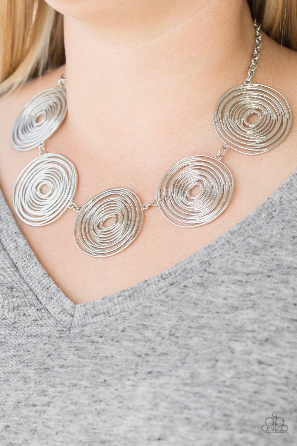 Paparazzi Accessories SOL-Mate - Silver Brushed in a high-sheen finish, swirling silver frames link below the collar for a seasonal look. Features an adjustable clasp closure. Jewelry