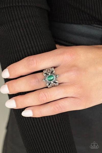 Paparazzi Accessories Reformed Refinement - Green A glassy Mint cat's eye stone is pressed into the center of a studded and metallic rope-like frame. Leafy floral bands delicately overlap the whimsical frame, coalescing into a tropical inspired centerpiec