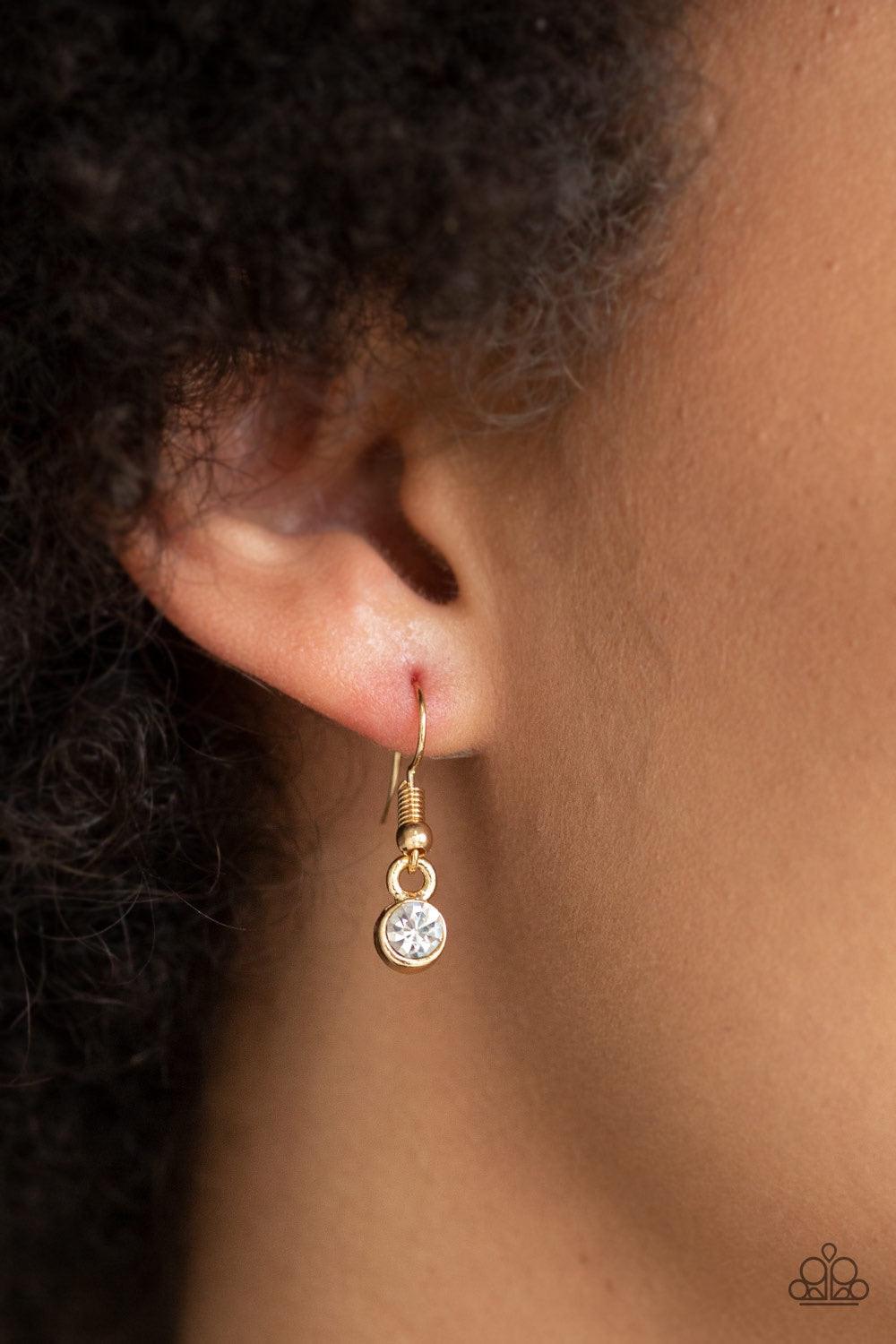 Paparazzi Accessories Super Starstruck - Gold Pairs of glittery white rhinestones join below the collar for a timeless look. Features an adjustable clasp closure. Jewelry
